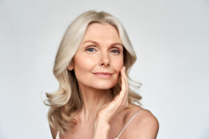 Woman showing beautiful skin and youthful appearance after a browlift procedure.
